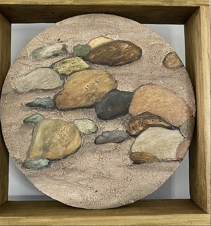 Stenen in zand painted by Hannie Hopster